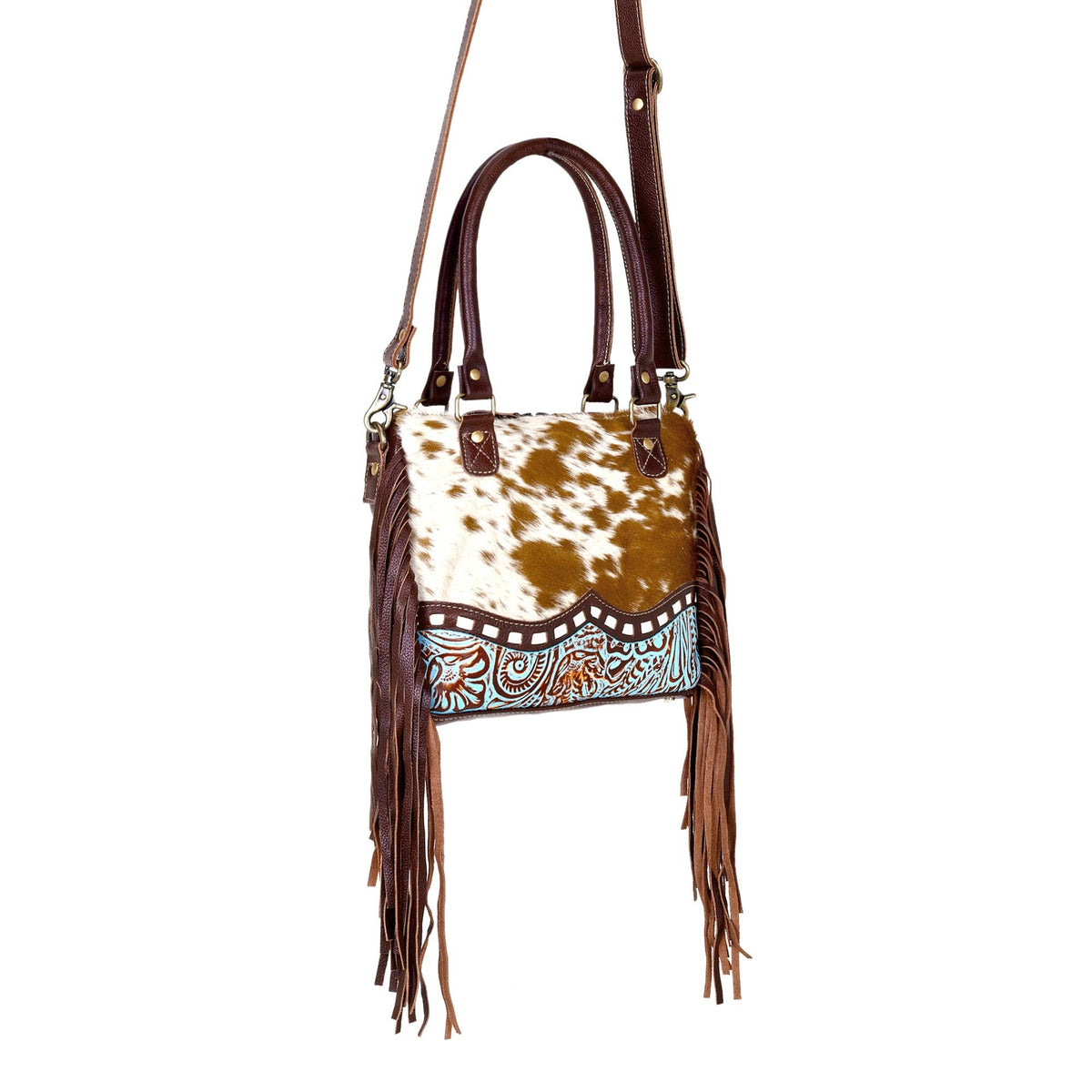 Chic brown and white hairon leather bag with fringe detailing, featuring two adaptable straps for versatile carrying options.
