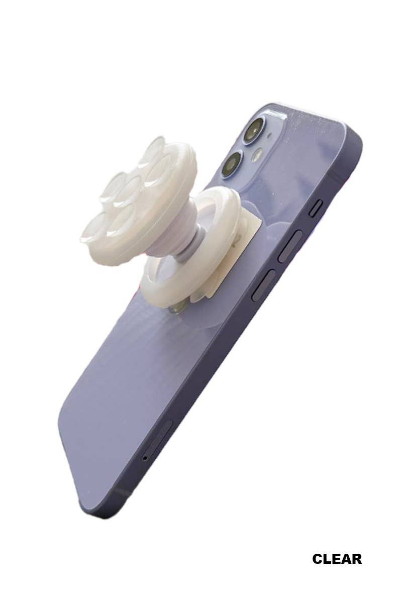 A white suction cup phone grip designed for easy holding and standing, featuring a circular design with multiple protrusions.