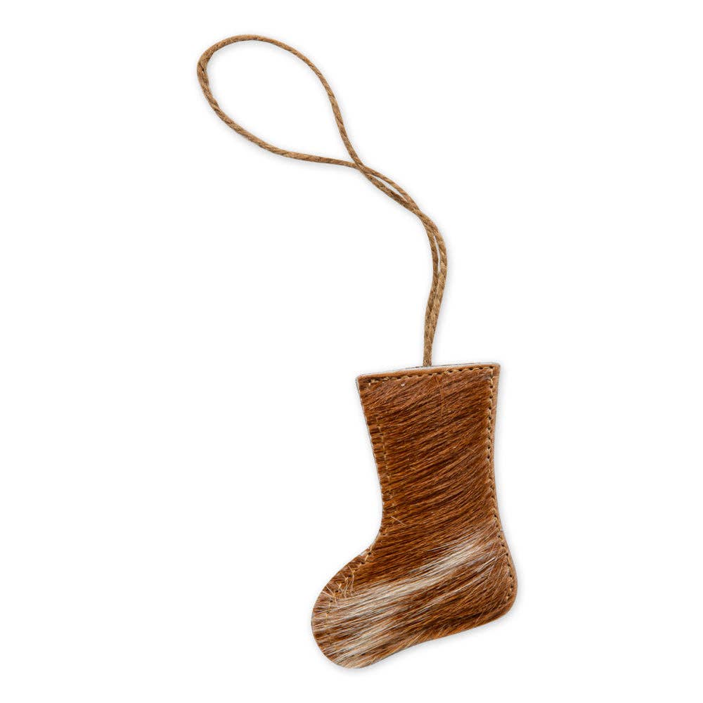 Brown hair-on hide stocking ornament with stitched edge and jute hanger, showcasing unique textures and rustic charm.