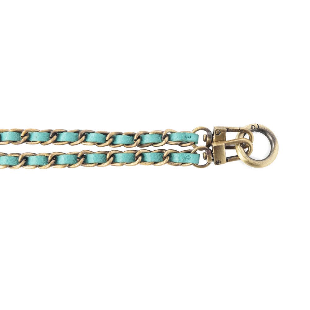 Teal leather twisted with silver links forms a stylish phone chain, perfect for hands-free use.