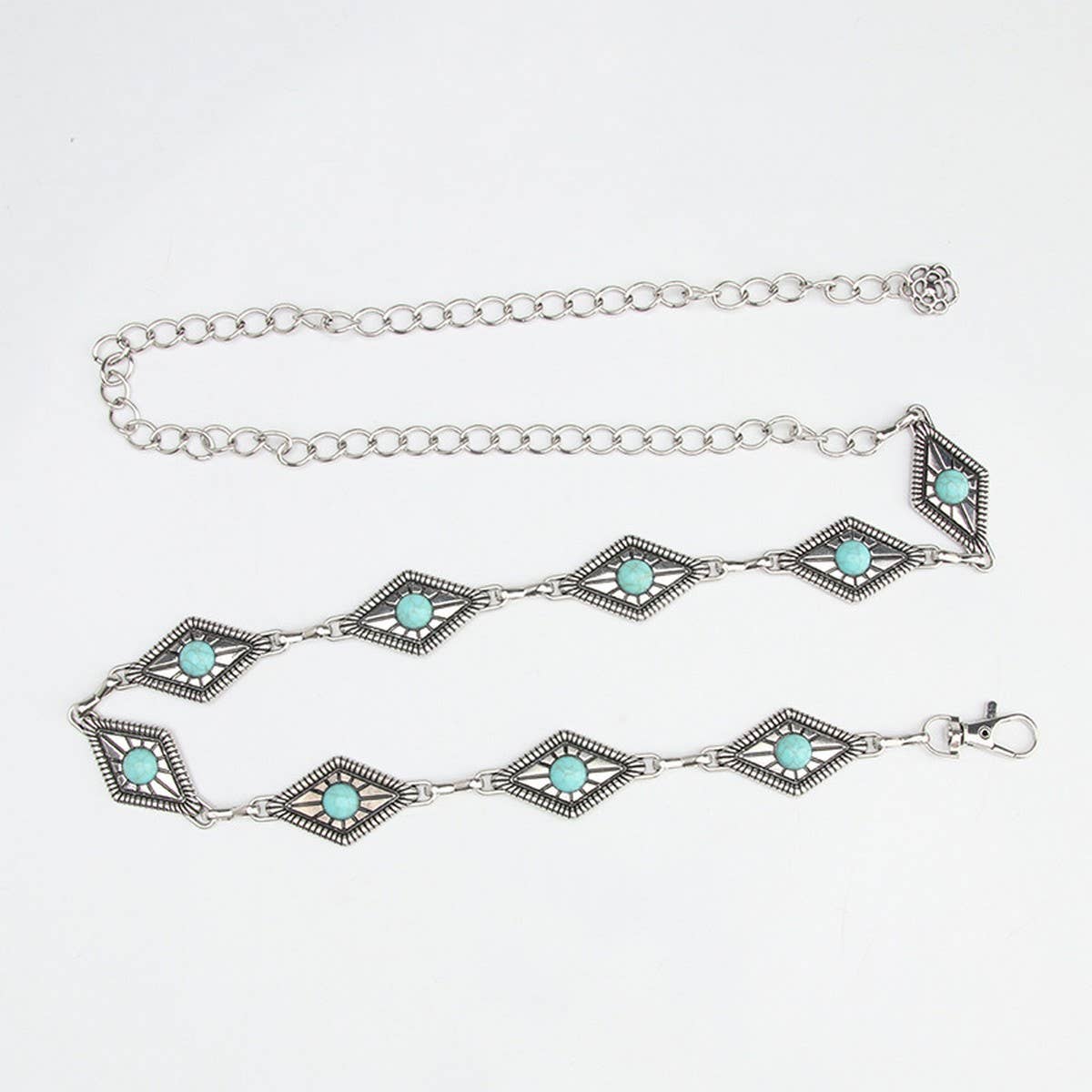 Waist chain belt featuring a vintage pattern with turquoise accents and a silver chain design.