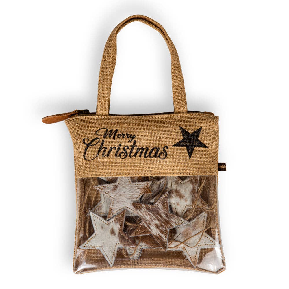 Woven burlap bag with a clear front holding ten brown hair-on hide star ornaments with stitched edges and jute hangers.