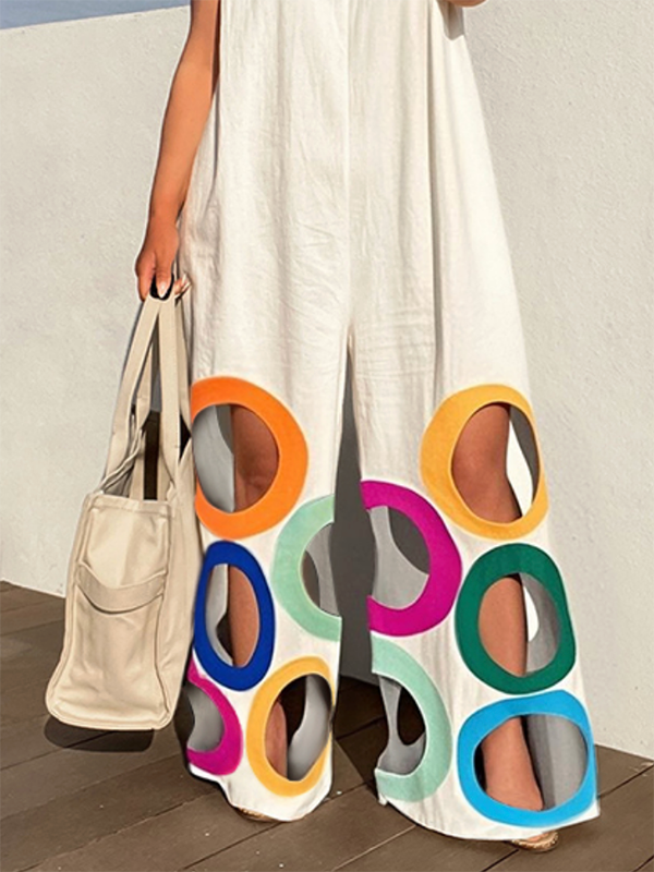 Loose sleeveless jumpsuit featuring colorful cutout patterns and convenient side pockets, perfect for casual outings.