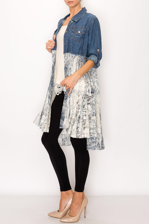 Cropped denim jacket with floral lace overlay, button-up front, and rolled sleeves, styled over a light top with black leggings.