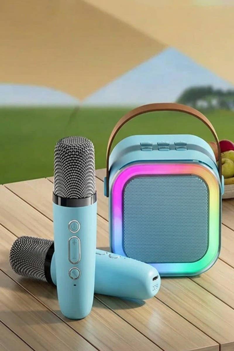 Karaoke Bluetooth speaker set featuring two microphones and LED lights, perfect for outdoor fun and entertainment.
