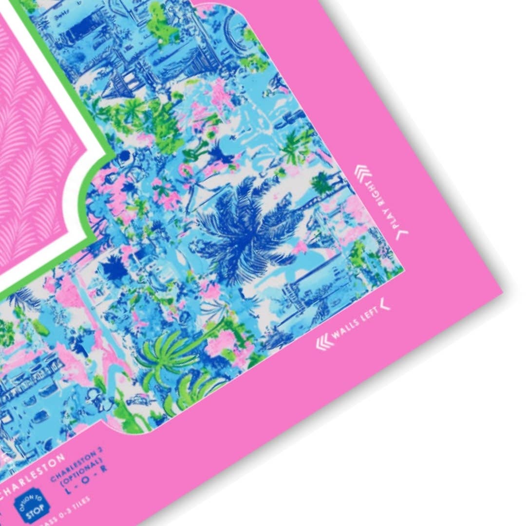 Vibrant Palm Beach Collection Mahjong mat featuring tropical patterns in pink, blue, and green hues with a playful design.