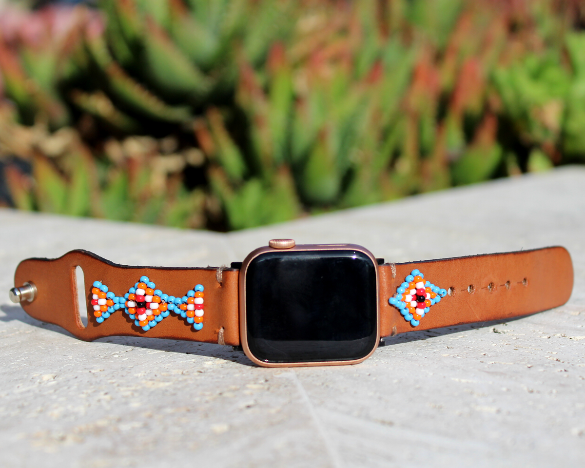 Beaded leather band for Apple Watch featuring colorful Navajo and Aztec inspired designs, perfect for daily wear.