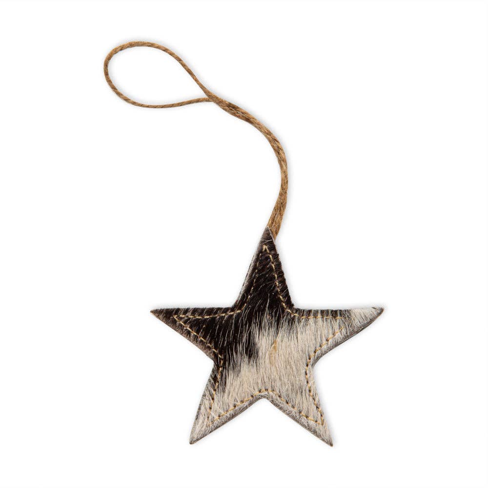 Star-shaped ornament featuring a hair-on hide texture and stitched edges, complete with a natural jute hanger.