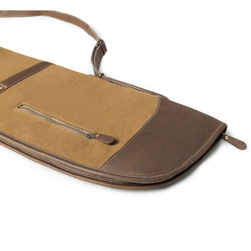 Antique olive cotton rifle case with leather panel accents, featuring a structured profile, handle, and shoulder strap.