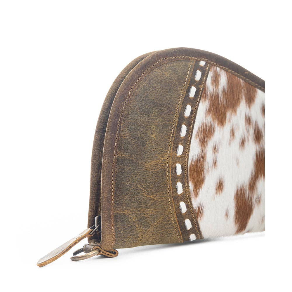 Rounded gun case featuring a mix of textures with a wrap-around zipper and leather pull tab, perfect for medium to longer handguns.