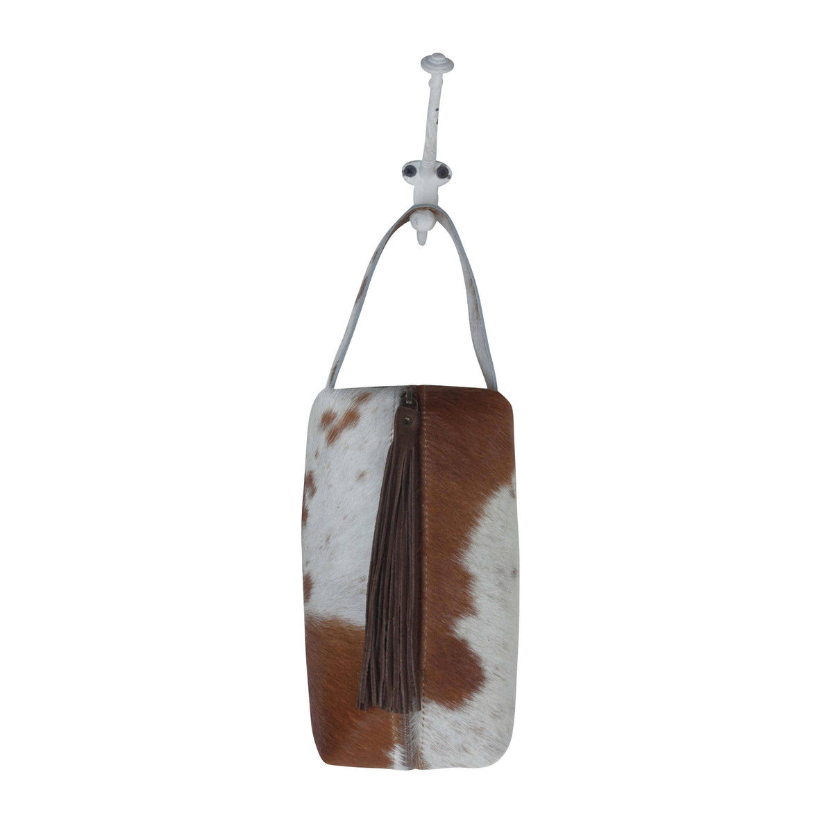 Wistful Skies Shaving Kit featuring a hair-on hide design and leather handle with a stylish fringe zipper pull.