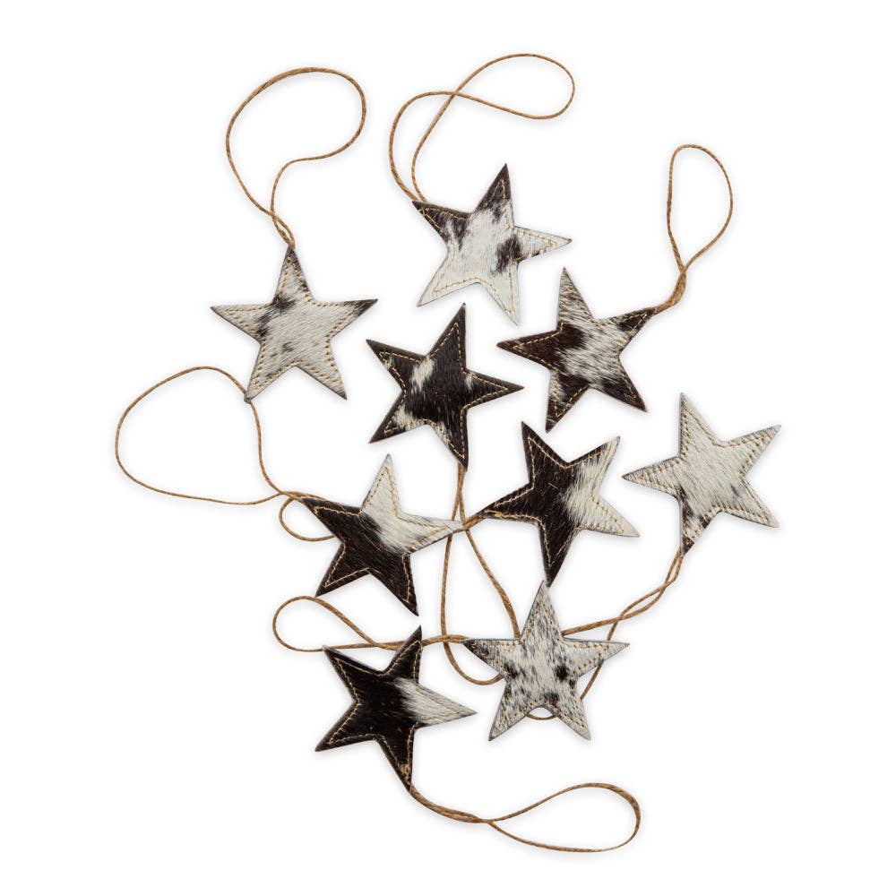 A set of ten black hair-on hide star ornaments with jute hangers, showcasing unique stitching details.