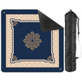 Navy Manor Mahjong Mat featuring a floral pattern and cane webbing-inspired border, designed for smooth gameplay and non-slip support.