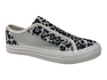 Casual black and white floral mesh sneaker with a slip-on design and white rubber sole, perfect for versatile wear.