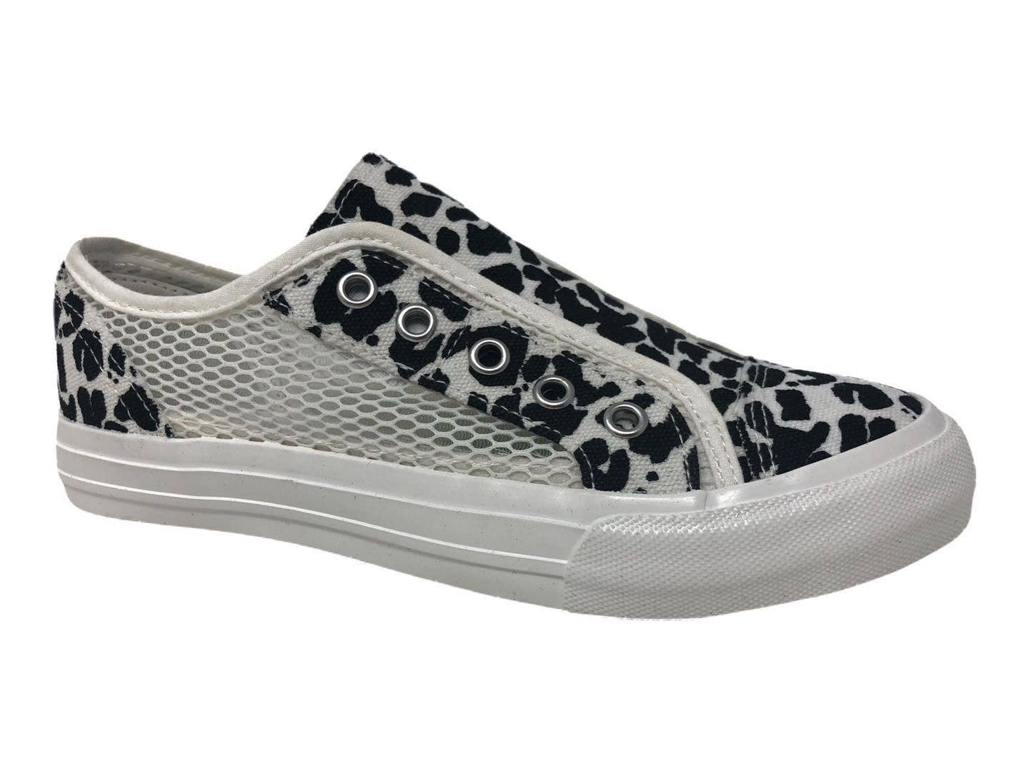 Casual black and white floral mesh sneaker with a slip-on design and white rubber sole, perfect for versatile wear.