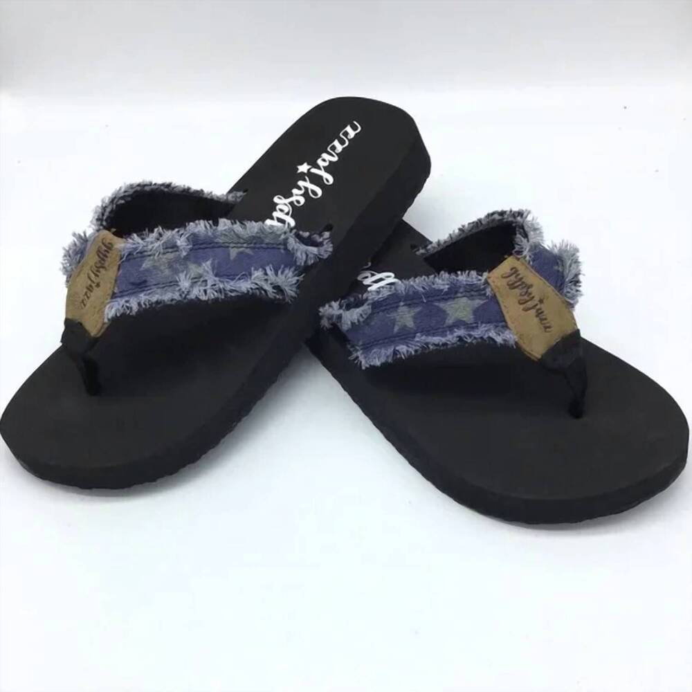 Navy flip flops with a star pattern strap and a black sole, featuring a stylish frayed edge design.