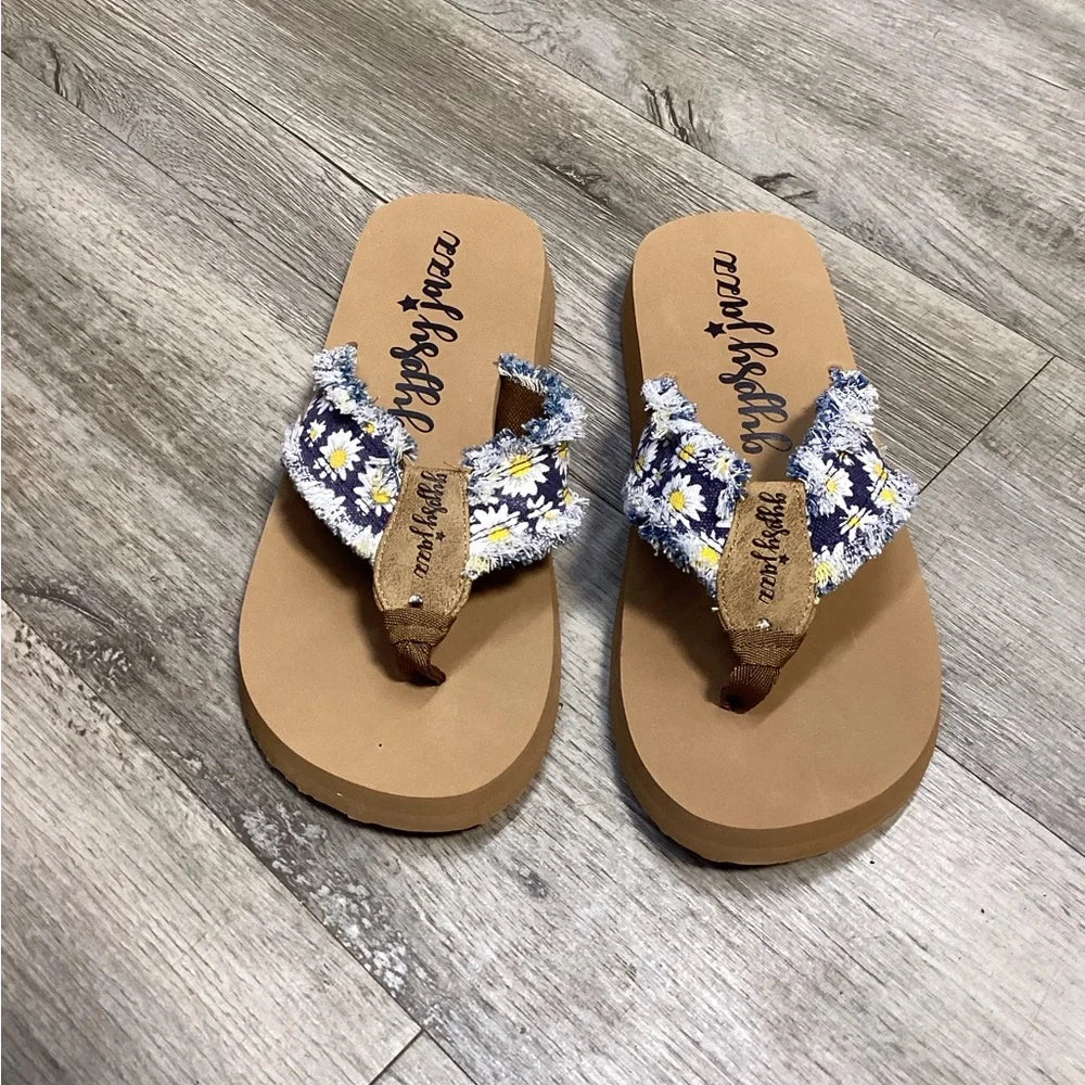 Floral-patterned straps and flat soles define these stylish Gypsy Jazz Sandals, perfect for summer outings.