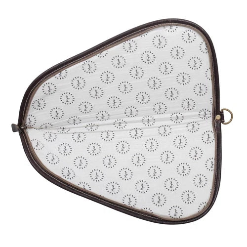 Stylish black and white gun cover with a dark brown outline and zipper closure, featuring a triangular shape and circular interior motif.
